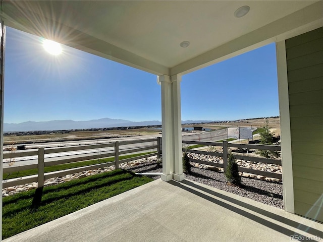 view of patio / terrace featuring a mountain view