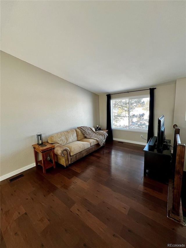 living room with dark wood-type flooring