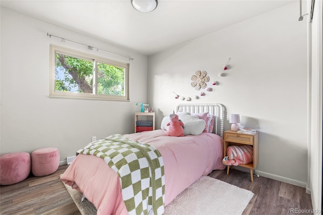 6254 W 79th Ave, Arvada, CO 80003 - bedroom with wood finished floors and baseboards