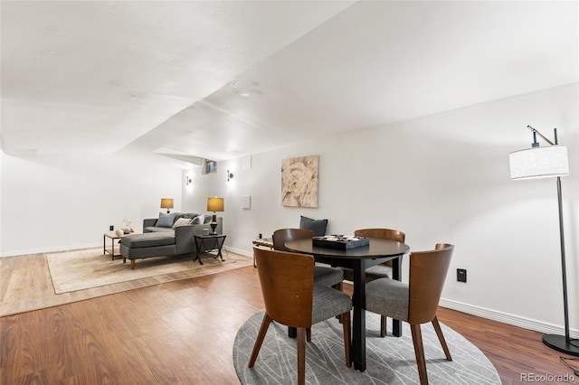 6254 W 79th Ave, Arvada, CO 80003 - dining space with wood finished floors and vaulted ceiling