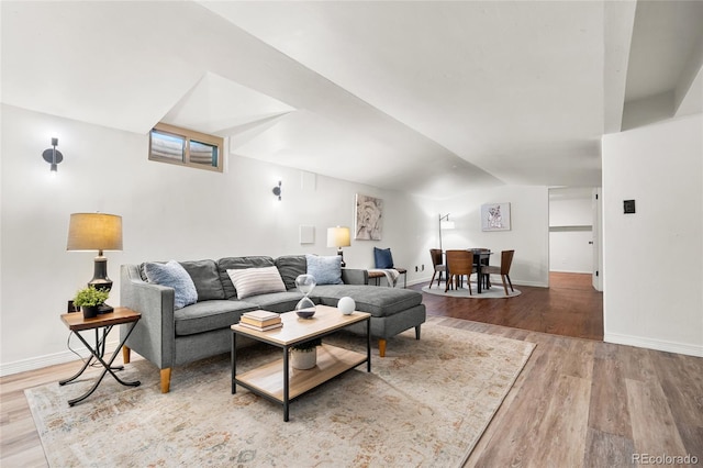 6254 W 79th Ave, Arvada, CO 80003 - living area with wood finished floors and lofted ceiling