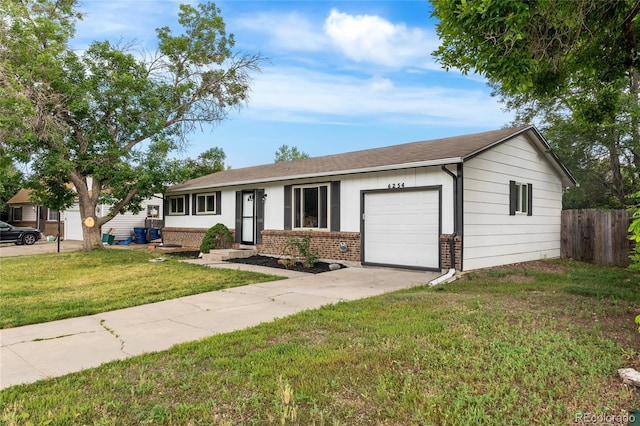 6254 W 79th Ave, Arvada, CO 80003 - ranch-style house featuring brick siding, a garage, and concrete driveway