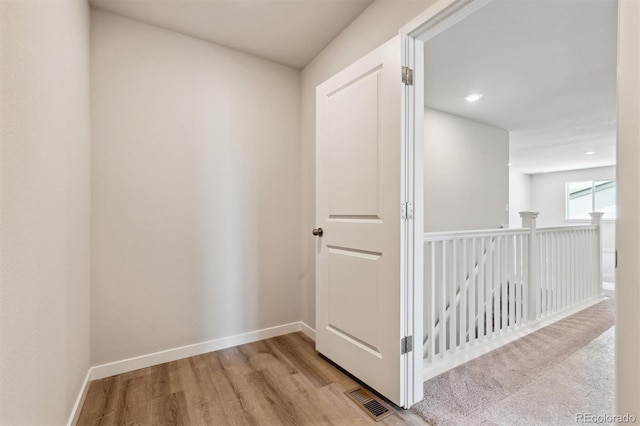 hall featuring light hardwood / wood-style floors