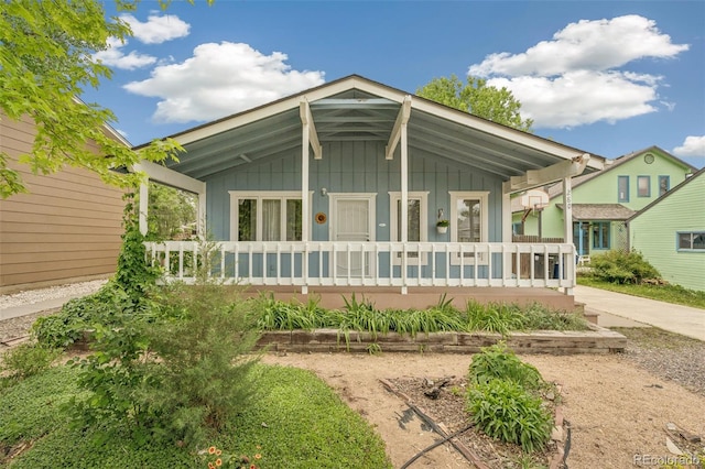 280 Pierce St, Erie, CO 80516 - view of front of home featuring a porch and board and batten siding