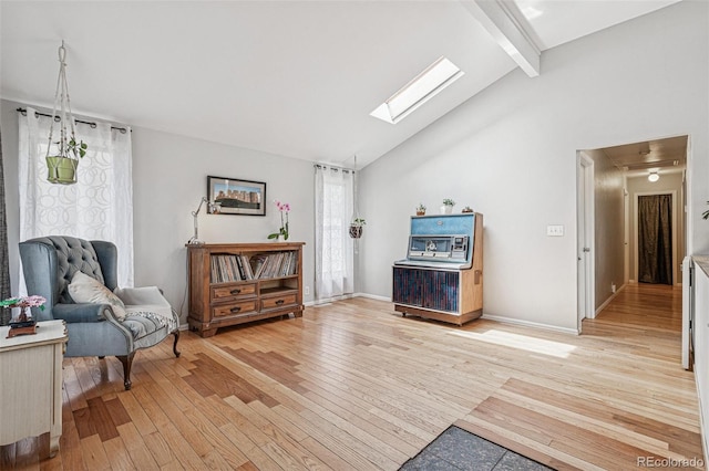 280 Pierce St, Erie, CO 80516 - sitting room featuring a skylight, light wood-style floors, and baseboards