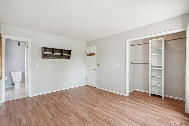 280 Pierce St, Erie, CO 80516 - unfurnished bedroom with light wood-style flooring, baseboards, ensuite bathroom, and a closet