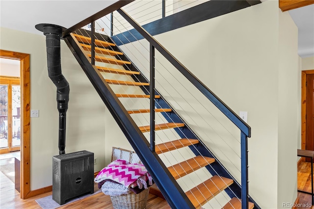 stairway with wood-type flooring