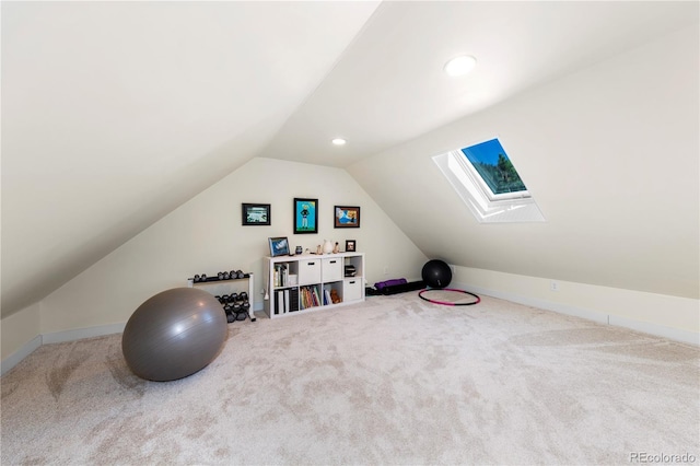 workout area with a skylight, lofted ceiling, carpet floors, baseboards, and recessed lighting