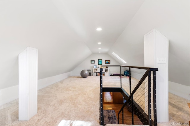 additional living space featuring lofted ceiling, carpet, recessed lighting, and baseboards