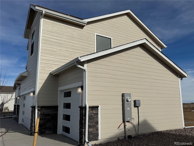 view of home's exterior featuring a garage