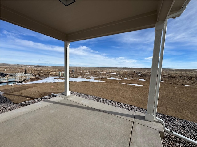 view of snow covered patio