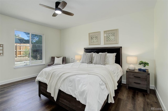 bedroom featuring ceiling fan and dark hardwood / wood-style flooring