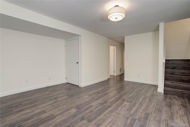 interior space with dark hardwood / wood-style floors