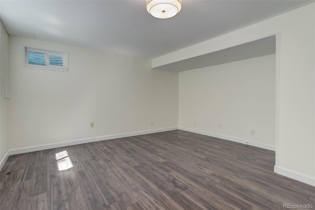 basement featuring dark hardwood / wood-style floors