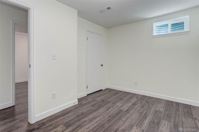 interior space with dark wood-type flooring