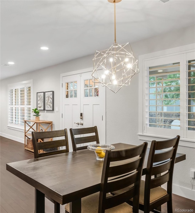 9861 E Ohio Ave, Denver, CO 80247 - dining room featuring baseboards, a chandelier, dark wood finished floors, and recessed lighting
