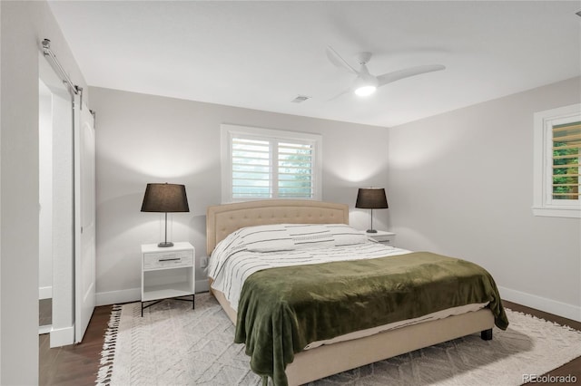 9861 E Ohio Ave, Denver, CO 80247 - bedroom with baseboards, wood finished floors, and ceiling fan