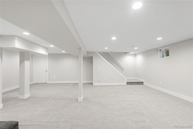 9861 E Ohio Ave, Denver, CO 80247 - finished basement featuring light colored carpet, baseboards, recessed lighting, and stairs
