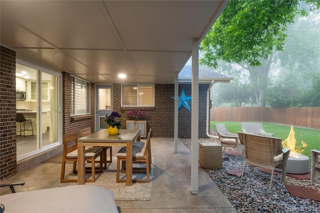 9861 E Ohio Ave, Denver, CO 80247 - fenced backyard featuring a patio area and outdoor dining area