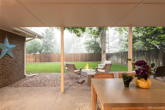 9861 E Ohio Ave, Denver, CO 80247 - view of patio / terrace with an outdoor fire pit
