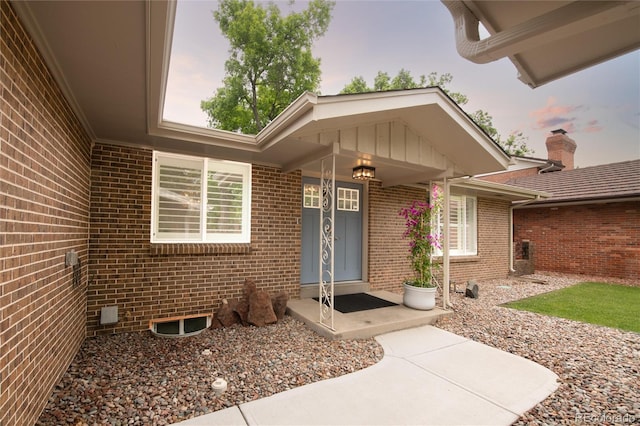9861 E Ohio Ave, Denver, CO 80247 - doorway to property with brick siding