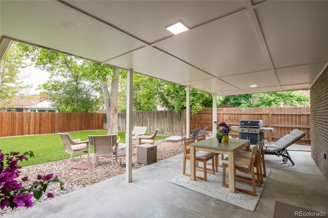 9861 E Ohio Ave, Denver, CO 80247 - view of patio / terrace with a grill and outdoor dining space