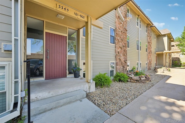 3365 Chisholm Trl Unit B102, Boulder, CO 80301 - view of exterior entry featuring board and batten siding