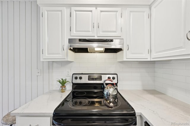 3365 Chisholm Trl Unit B102, Boulder, CO 80301 - kitchen featuring electric stove, range hood, white cabinets, tasteful backsplash, and light stone counters