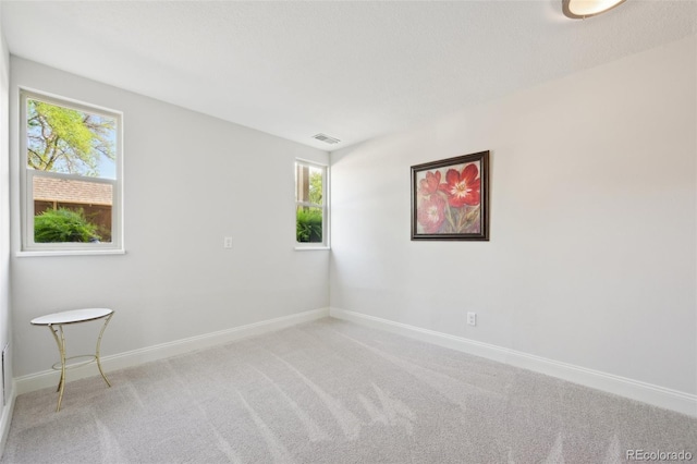3365 Chisholm Trl Unit B102, Boulder, CO 80301 - empty room with light colored carpet and baseboards