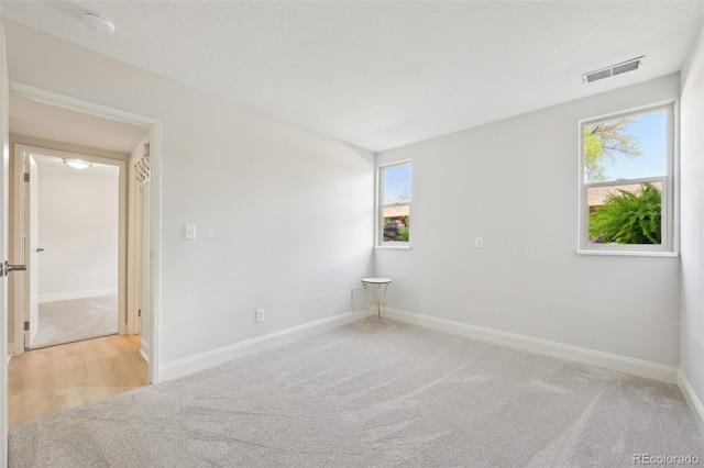 3365 Chisholm Trl Unit B102, Boulder, CO 80301 - carpeted empty room with baseboards