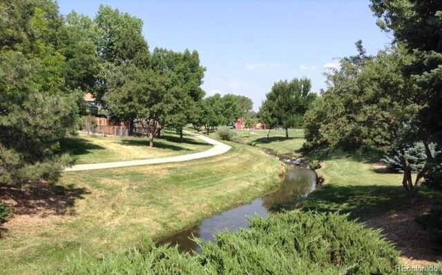 4665 E Peakview Ave, Centennial, CO 80121 - view of home's community with a yard and view of wooded area
