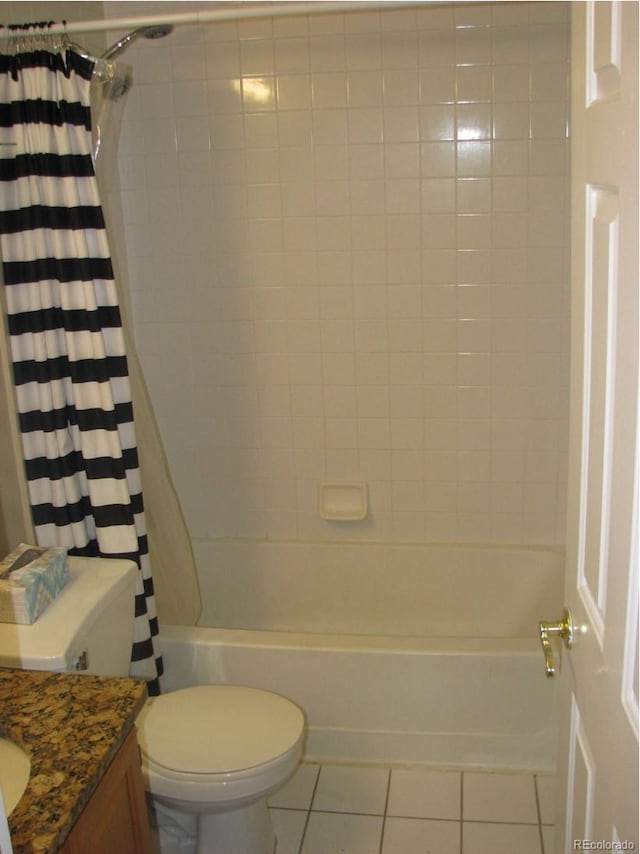 full bathroom featuring tile patterned flooring, vanity, toilet, and shower / bath combo