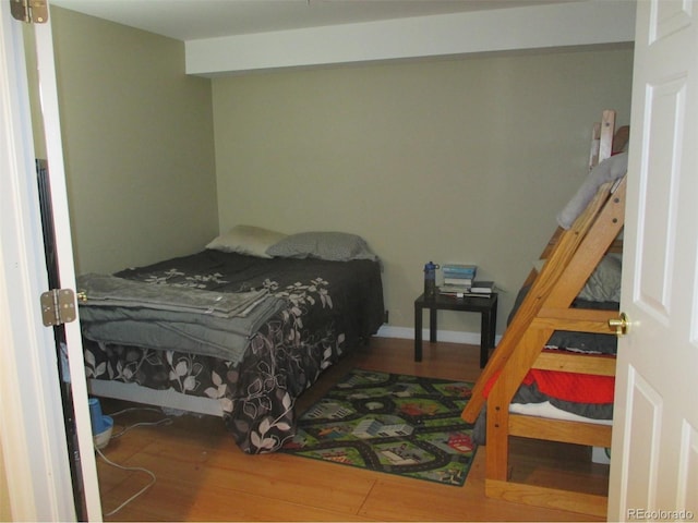 bedroom featuring hardwood / wood-style flooring