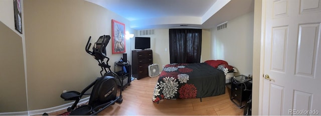 bedroom featuring wood-type flooring