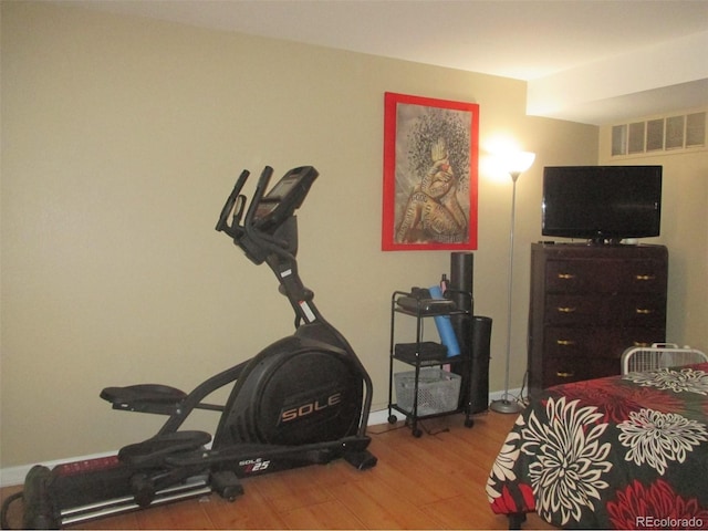 bedroom featuring hardwood / wood-style flooring