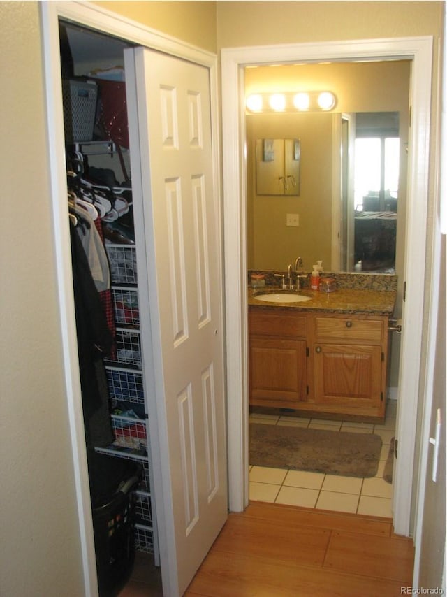 bathroom featuring tile patterned floors and vanity