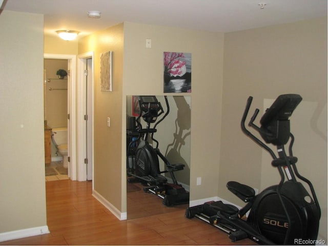 exercise area with hardwood / wood-style floors