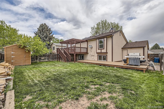 rear view of house with a wooden deck, a pergola, an outbuilding, a storage shed, and stairs