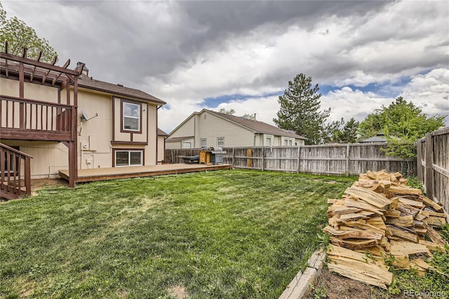 view of yard with a deck