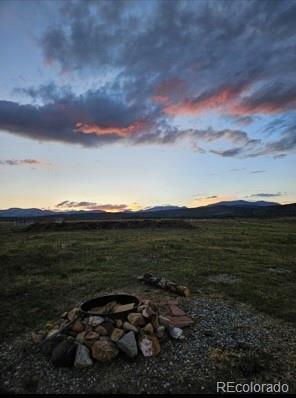 24870 US Highway 285, Fairplay, CO 80440 - view of yard with a fire pit