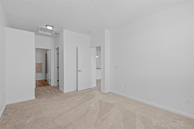 4100 Albion St Unit 320, Denver, CO 80216 - unfurnished bedroom with light colored carpet and ensuite bath
