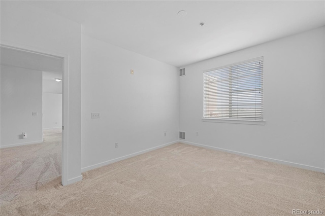 4100 Albion St Unit 320, Denver, CO 80216 - unfurnished room with light colored carpet and fire sprinkler in ceiling