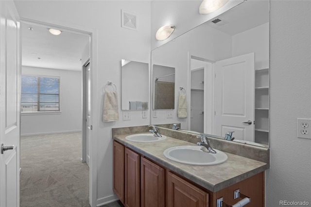 4100 Albion St Unit 320, Denver, CO 80216 - full bath with double vanity and a shower