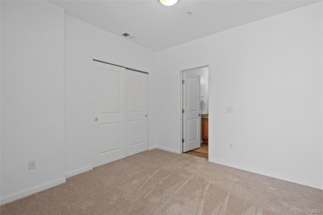 4100 Albion St Unit 320, Denver, CO 80216 - unfurnished bedroom with carpet floors and a closet