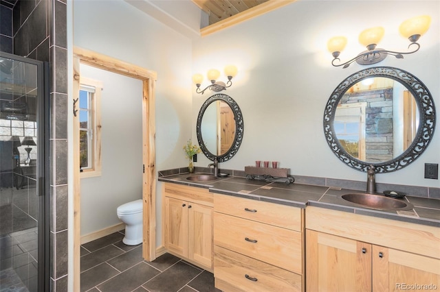 632 Gcr 662, Grand Lake, CO 80447 - bathroom featuring double vanity, a sink, tile patterned floors, and a shower stall