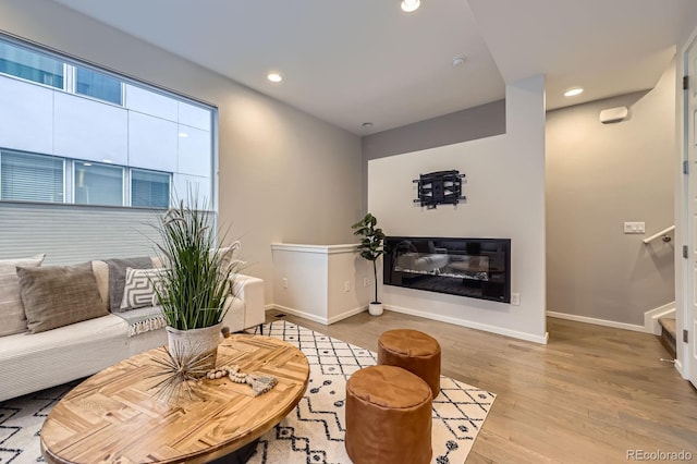 3256 Federal Blvd, Denver, CO 80211 - living area with wood finished floors, baseboards, recessed lighting, and stairs