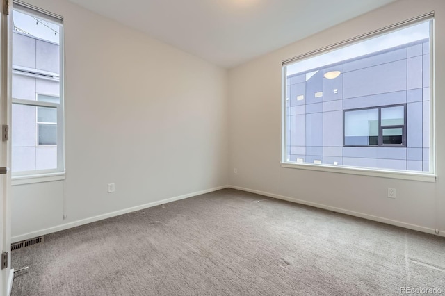 3256 Federal Blvd, Denver, CO 80211 - empty room featuring carpet flooring and baseboards