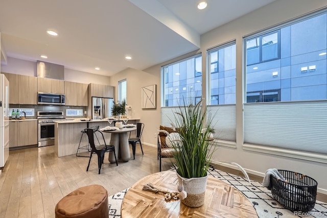 3256 Federal Blvd, Denver, CO 80211 - dining space with light wood finished floors and recessed lighting