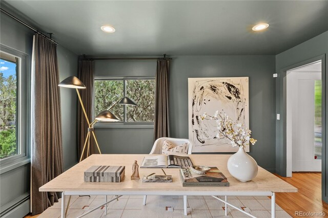 details with a baseboard radiator, wood finished floors, and recessed lighting
