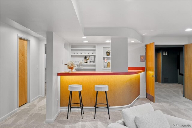 bar with bar area, baseboards, carpet, recessed lighting, and built in shelves